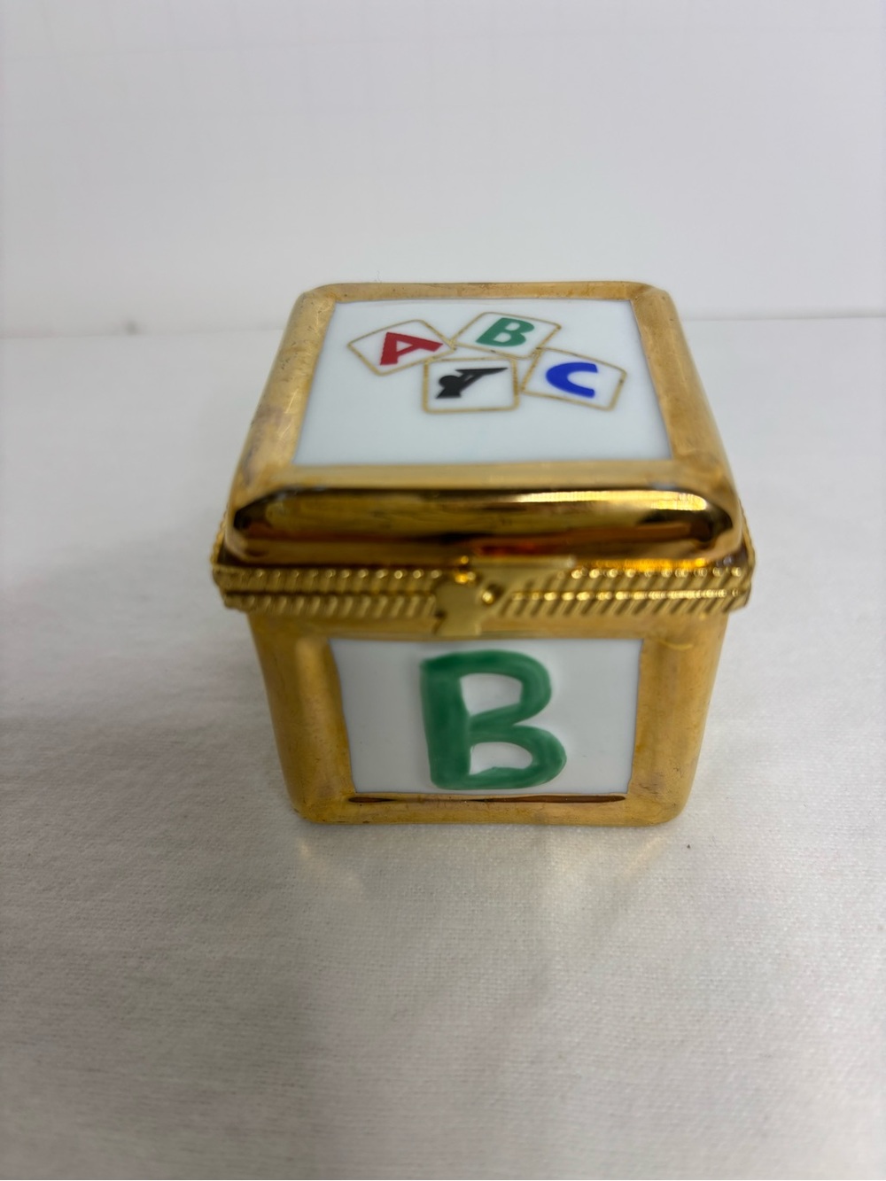 Porcelain ABC Block Trinket Box with Gold Trim. 
Ronda Roush Studios.